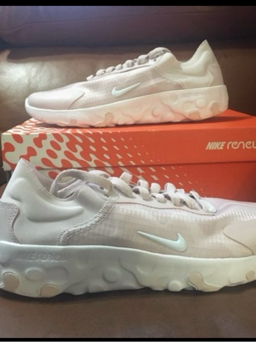 Nike React sneakers in pale pink and white